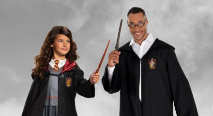 Two people in Harry Potter-themed costumes.