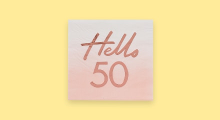 A napkin that reads "Hello 50".