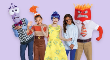 Five people wearing Inside Out-themed costumes for the emotions Fear, Anxiety, Joy, Sadness and Anger.