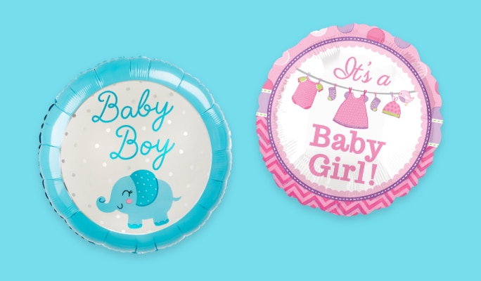 A blue helium-filled ballon with the words 'Baby Boy' on the front beside a pink balloon with the words 'Baby Girl'.