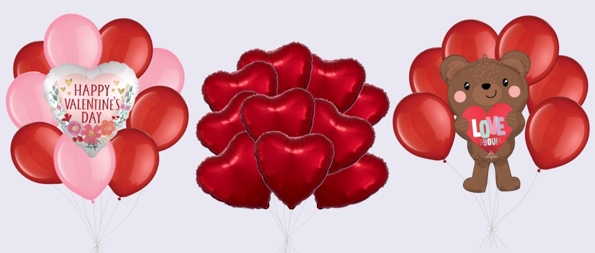  A bouquet of red and pink balloons surrounding a heart-shaped balloon with the words 'Happy Valentine's Day' on the front, next to an all-red heart-shaped balloon bouquet and  a red balloon bouquet with a teddy bear balloon holding a heart that says 'Love You'.