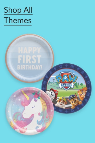 A unicorn, Happy First Birthday and PAW Patrol paper plates.