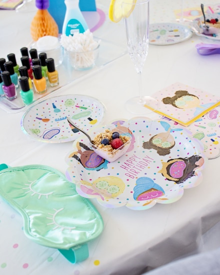 An overhead shot of a table dressed for a spa-themed party.