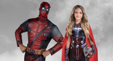 Two kids dressed as Thor and Spider-Man.