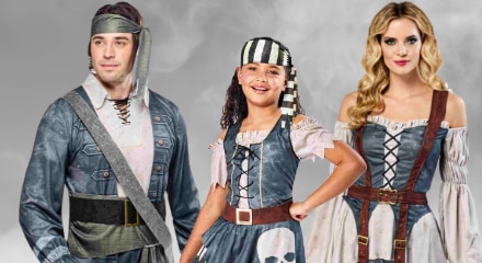 Three people dressed in pirate costumes.