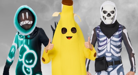 Three people in Fortnite-themed costumes: one in a glowing hoodie, Peely the banana, and a skeleton outfit.