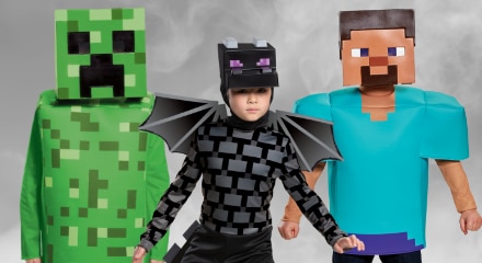 Three people dressed as Minecraft characters: a Creeper, the Ender Dragon, and Steve.