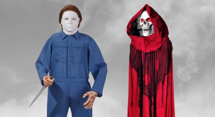 Animatronic Michael Meyers figure and a skeleton wearing a red cape.