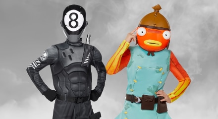 Two people in Fortnite costumes: 8-Ball and Fishstick.