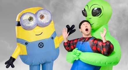 Two inflatable costumes: a Minion and a person being abducted by an alien.
