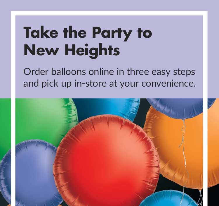 Close-up of colorful round balloons in red, blue, orange, and green.