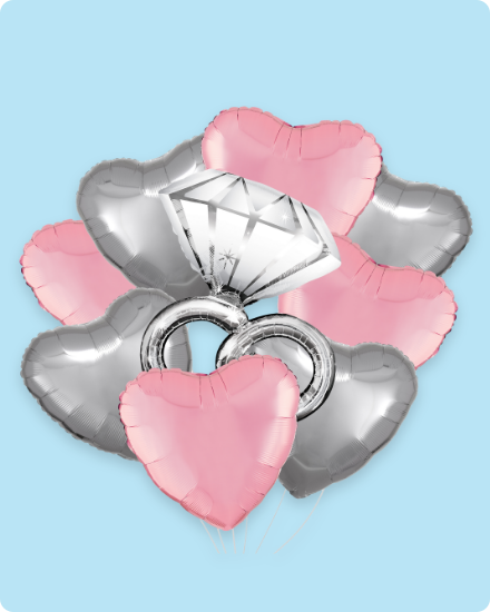 Heart-shaped balloons with a diamond ring balloon.