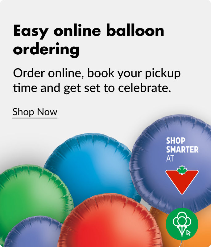 Six multi-coloured circular balloons sitting on a white background. 