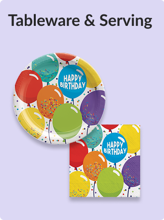 A large black and gold New Year's Eve balloon surrounded by smaller black, gold and white round and star balloons