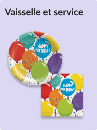 Une serviette en papier et une assiette de fête décorées de ballons verts, rouges, orange, turquoise, jaunes, violets et bleus avec le texte «&nbsp;Joyeux anniversaire&nbsp;» écrit dessus.