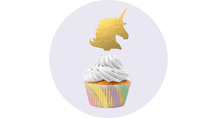 Multi-coloured letter candles that spell out 'HAPPY BIRTHDAY'