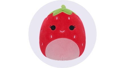 Strawberry plush toy with smiling face