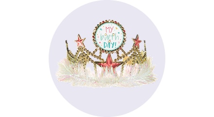 A festive birthday tiara with gold and pink stars, fluffy white trim, and a circular sign that reads "My Birthday!" in colorful letters