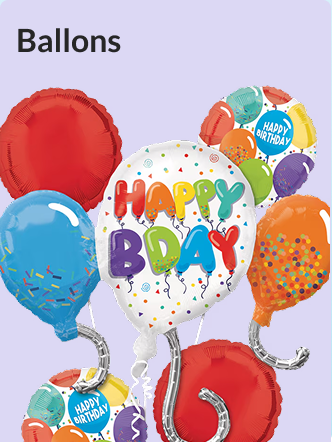 Un ballon blanc doté des mots «&nbsp;Happy Birthday&nbsp;» en lettres de couleurs différentes, entouré de ballons multicolores.