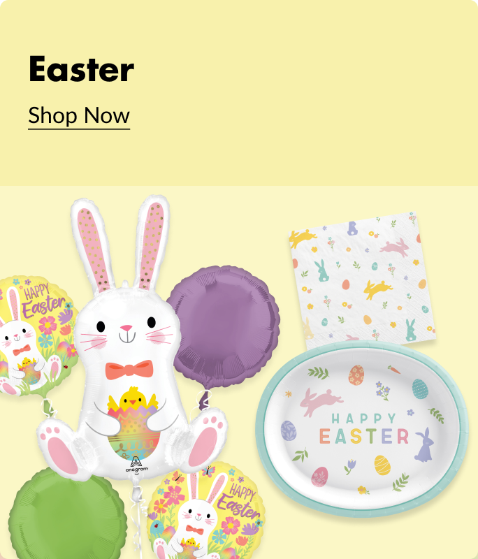 A rabbit holding a baby chick balloon surrounded by bunny balloons, Easter plates, napkins and purple and green circular balloons.