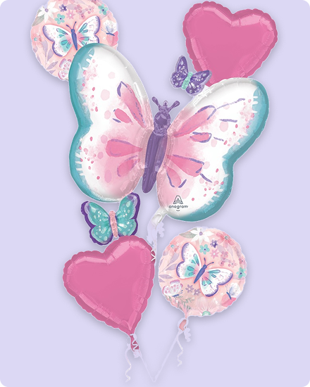 A butterfly-shaped balloon with pink heart-shaped balloons.